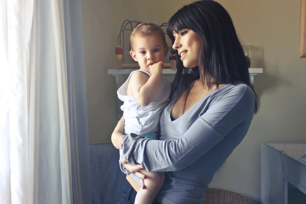 Mastering the First Impression: Your intriguing post title goes here A loving moment between a mother and her child in an indoor setting, fostering connection and warmth.